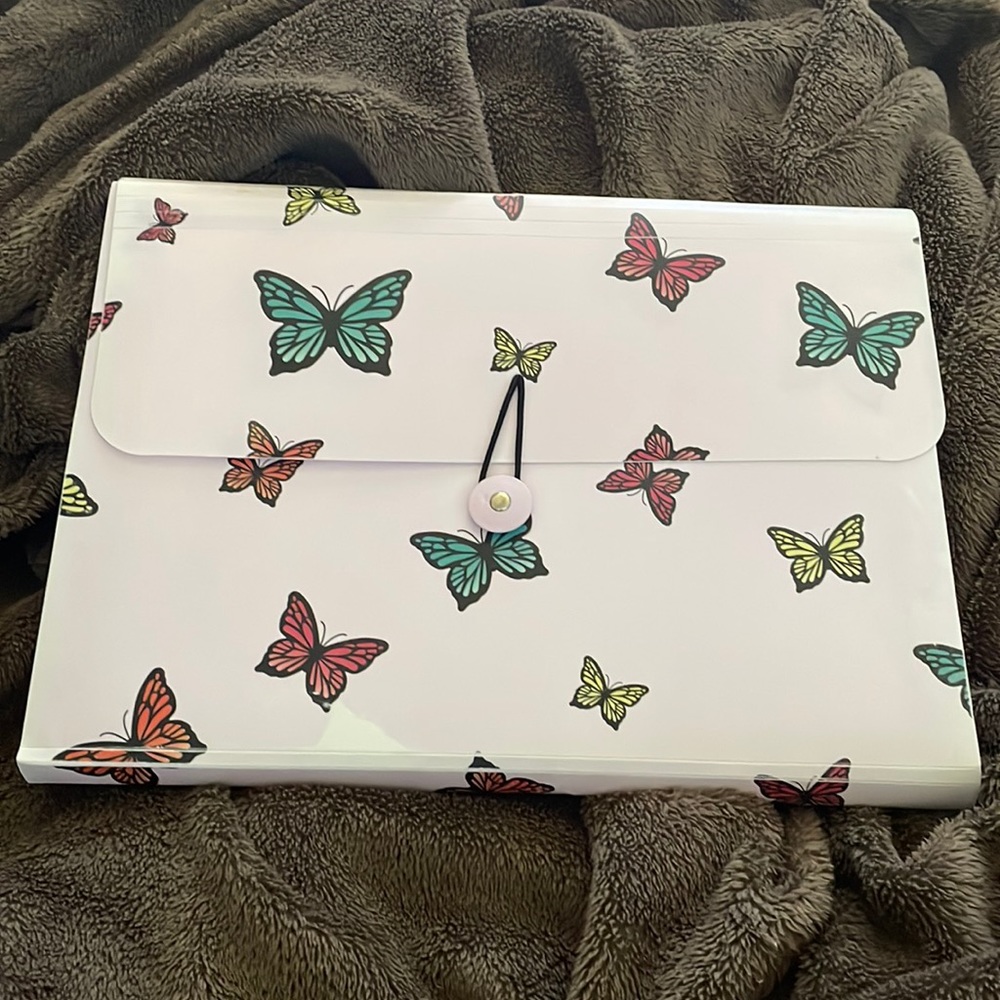 Beautiful multi color butterfly folder lightly used